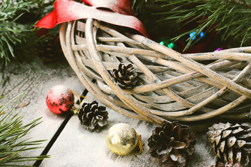 Christmas willow wreath with fir branches and Christmas toys © tes_dei