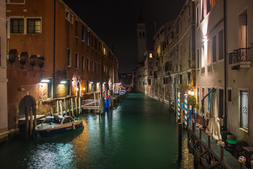 Canal in venice by night, in Italy