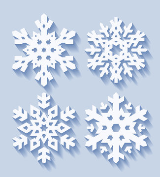 Set of four decorative snowflakes with shadow in flat style. Vec