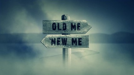 Old Wooden Sign on a Middle of a Cross Road With the Words Old Me or New Me - Powered by Adobe