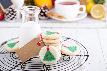 Christmas tree cookies with milk