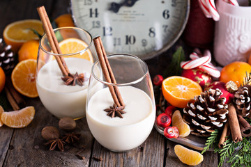 Eggnog with cinnamon in a rustic setting