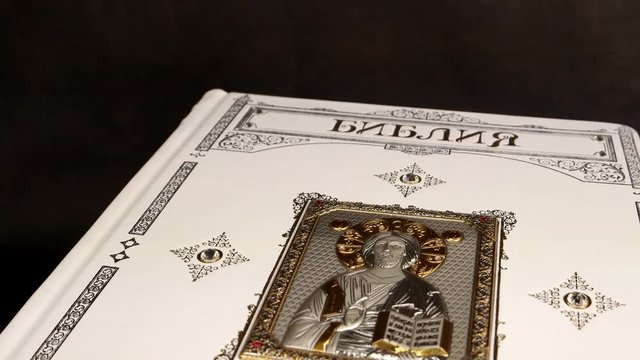 gold holy book, The Bible in engravings by Gustave Dore in Russian, precious book of the Bible, religion Christianity presentation exhibition of jewelry in the store Christmas gift luxury Jewelry shop