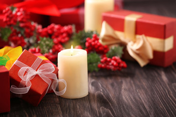 Christmas concept. Gift boxes and decorations on wooden table, closeup