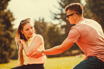 Upset lady rejects her man.