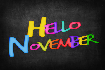 Obraz premium Hello November word on blackboard background