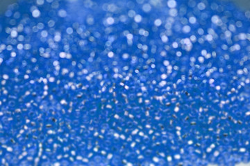 Abstract christmas blue lights on background. Defocused.