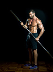 Gym iron bar as a spear.