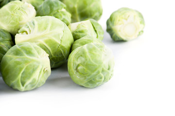 Fresh ripe brussels sprouts  on white 