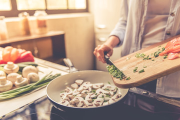 Beautiful girl cooking