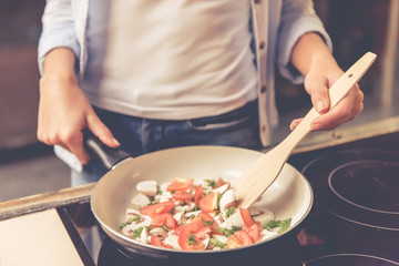 Beautiful girl cooking
