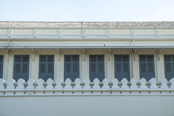 Facade of old abandoned building with windows