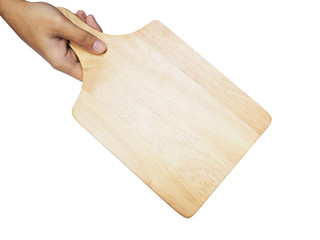 Hand holding wooden plate over white background. Top view