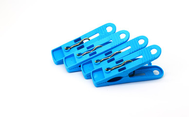 plastic clothespin on white background