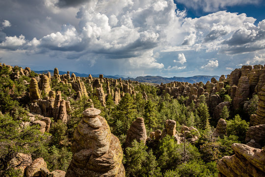 View of Sarah Deming Canyon with a monsoon storm as a back drop. Chiricahua National Monument.