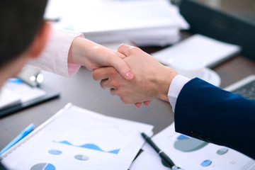 Business people shaking hands finishing up a meeting