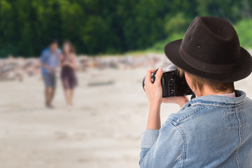 wedding photographer in action, attractive young woman shooting