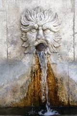 Fontana del Vecchio, fountain of the renaissance age, representing an old man, Sulmona, Abruzzo, Italy 