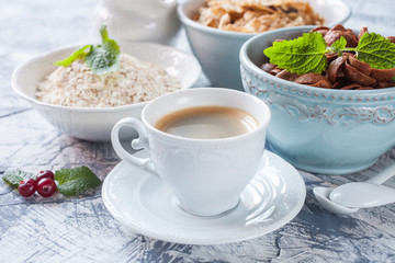 coffee and grain flakes on a table, selective focus