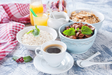 coffee and grain flakes on a table, selective focus