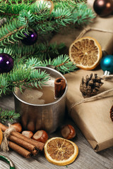Xmas present with cup of coffee and cinnamon
