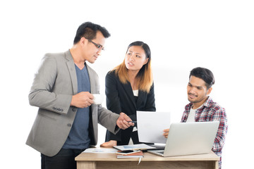 Portrait of business partners discussing documents and ideas at