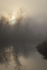 Misty morning on the river. Autumn Canada