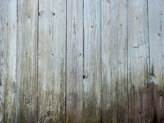 Old wooden background from the remains of paint and traces of use