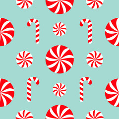 Seamless Pattern Decoration. Christmas Candy Cane Round white and red sweet set. Wrapping paper, textile template. Blue background. Flat design.