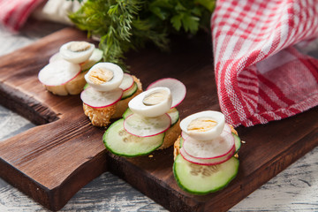 vegetables sandwiches on a board, selective focus