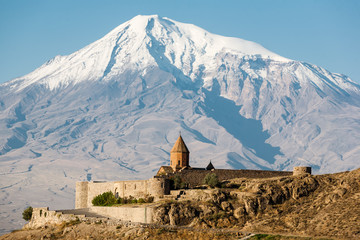Ancient Armenian church Khor Virap with Ararat on the background - obrazy, fototapety, plakaty