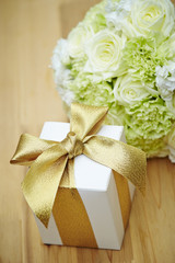 Gift box with flower bouquet 