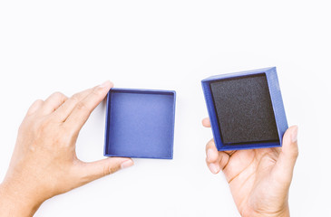 Hands hold and open the empty(blank) box on white background