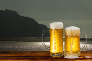 cold mug of beer in a landscape