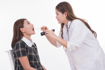 young woman at the physician checking his throat. female doctor
