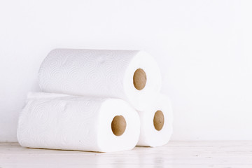 Roll of paper towel on wooden table