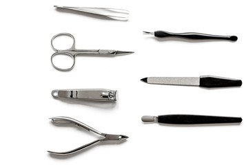 nail care - manicure set on white background top view