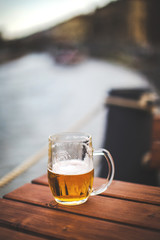  A mug of beer in a summer cafe in Prague