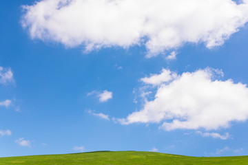 idyllic landscape of green heels, blue sky in Carpathian mountains