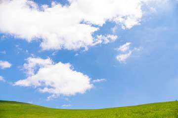 idyllic landscape of green heels, blue sky in Carpathian mountains