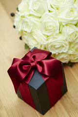 Gift box with flower bouquet 