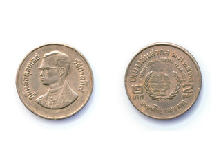 Old Thai coin on white background