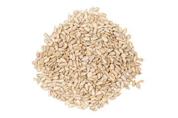 Shelled sunflower seeds over white background
