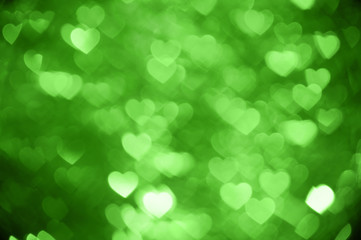 Fototapeta premium green heart bokeh background photo, abstract holiday backdrop