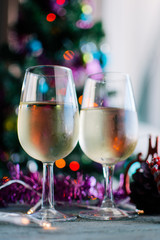 glasses of white wine with Christmas decoration