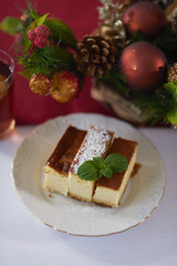 Three pieces of traditional cheesecake .