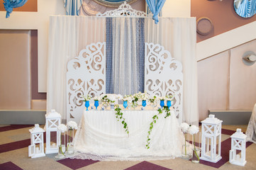 White wedding arch made of wood