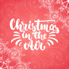 Christmas in the Air - lettering Christmas and New Year holiday calligraphy phrase isolated on the red doodle background. Fun brush ink for photo overlays, t-shirt print, flyer, poster design