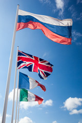 flags of many nations  the world waving