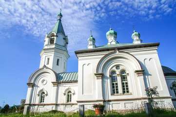 Fototapeta na wymiar Russian Orthodox Church with blue cloudy sky in Hakodate, Japan
